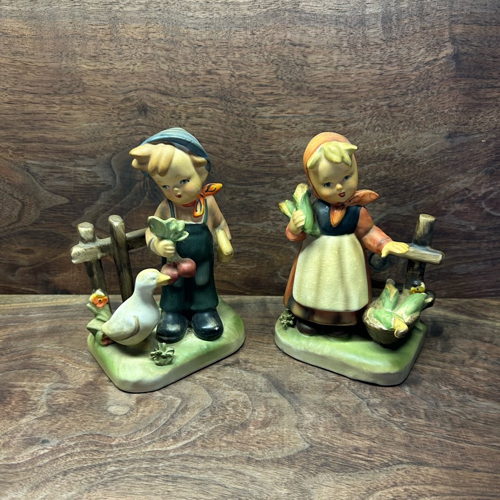 Erich Stauffer ‘Farm Life’ boy and girl figurine set.